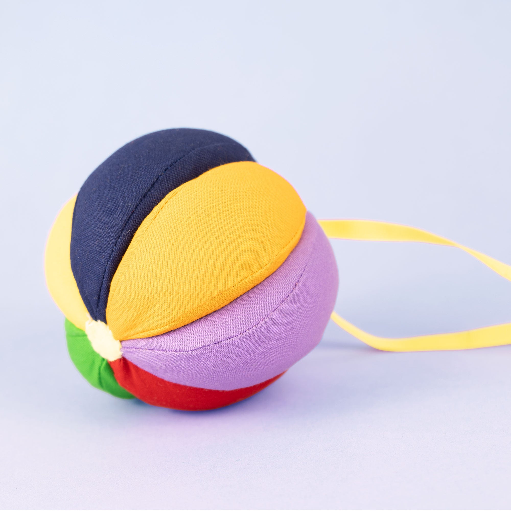 Balle d’éveil sensoriel arc-en-ciel